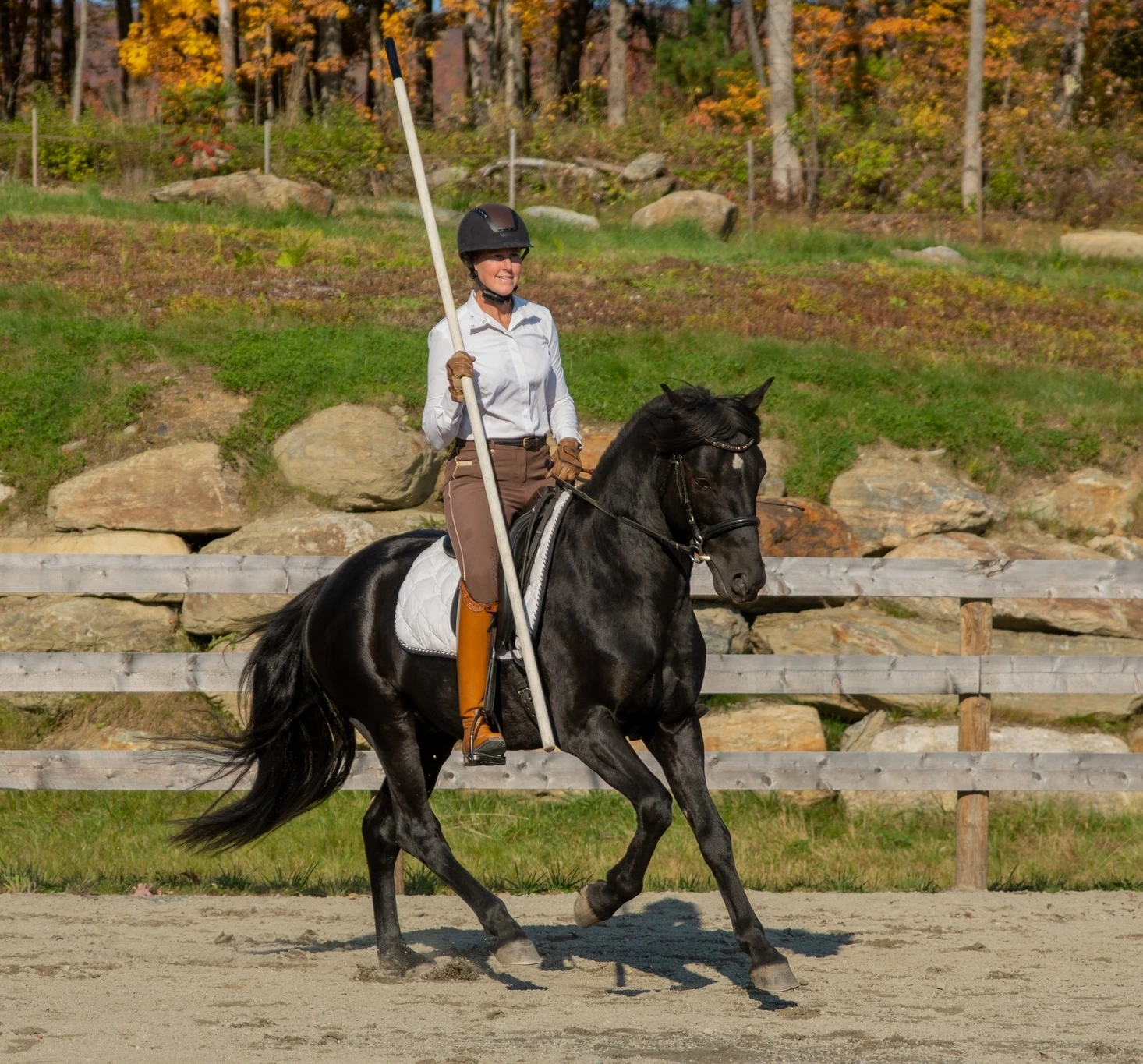 Stephanie Hayes riding holding WE garrocha pole